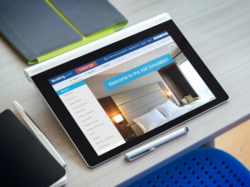 Tablet with Booking.com hotel booking management simulation