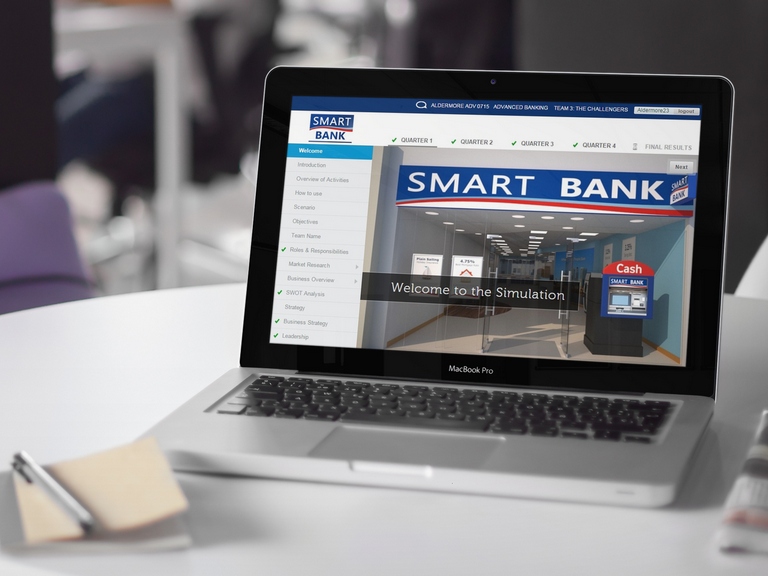 Laptop showing welcome page of SmartBank banking simulation